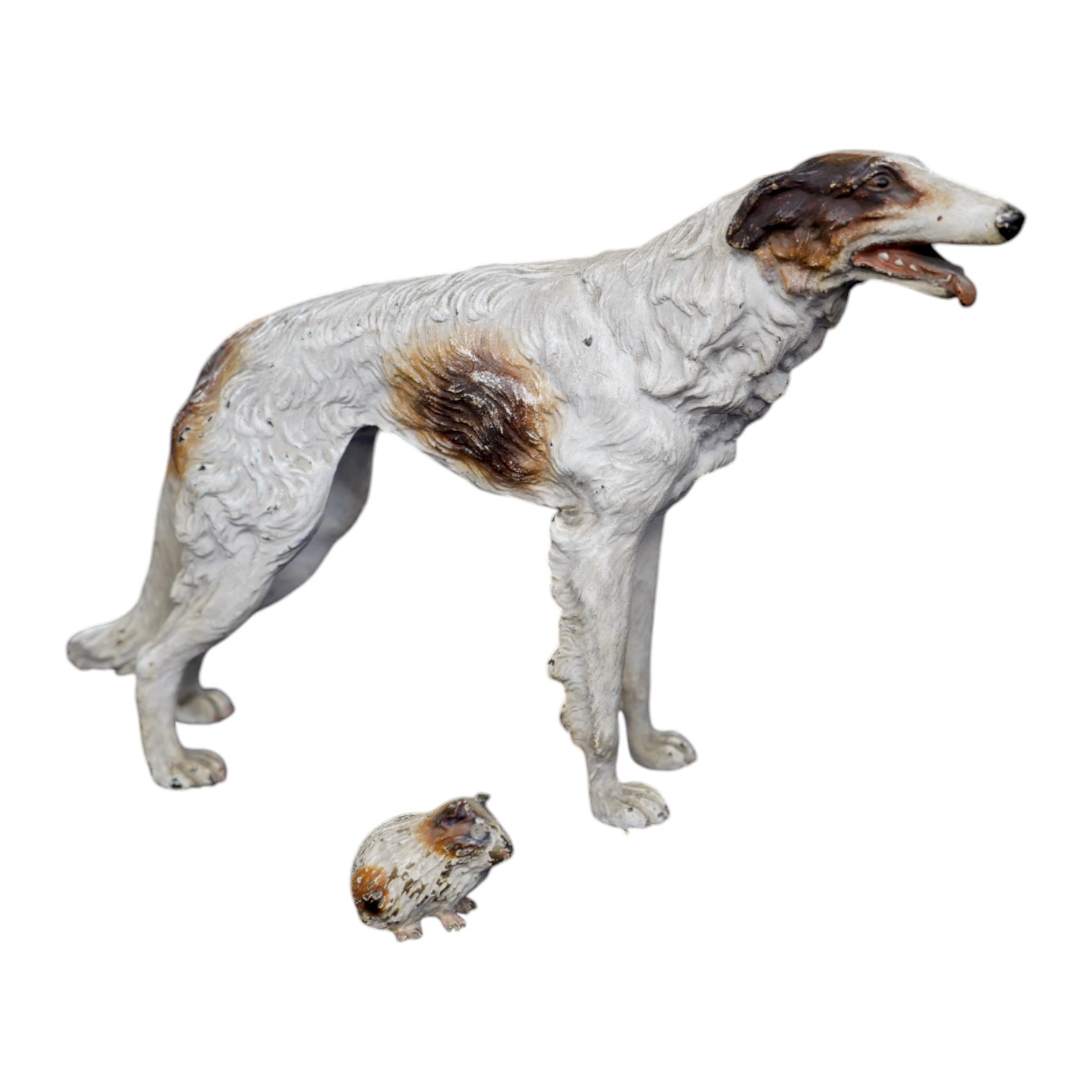 An Austrian cold painted bronze model of a borzoi, 24cm and a guinea pig, 4cm. Condition fair to good, minor chipping to paintwork.